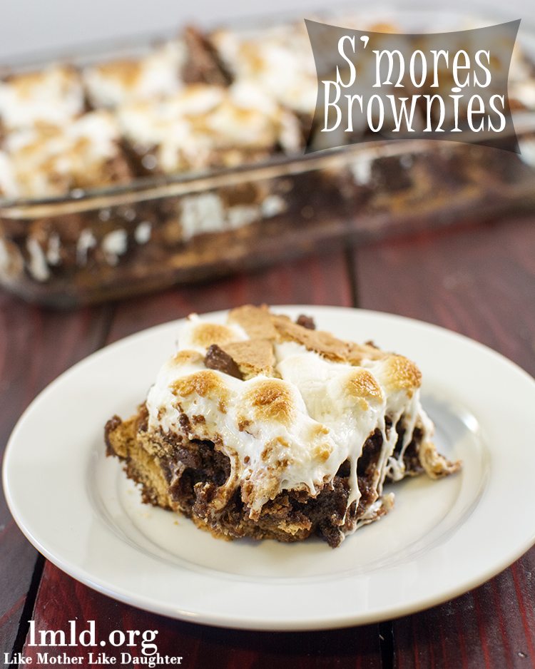 Front view of a smores brownie on a white plate.