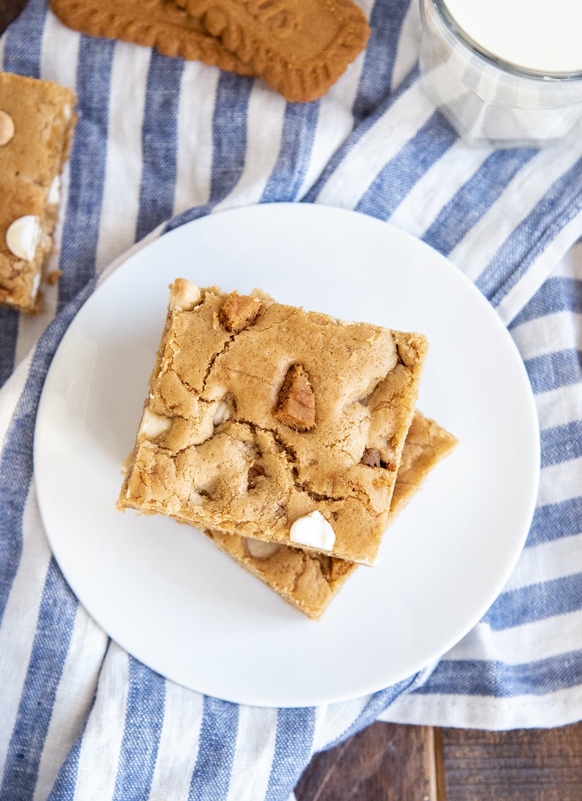 An overhead photo of cookie bars on a white plate.