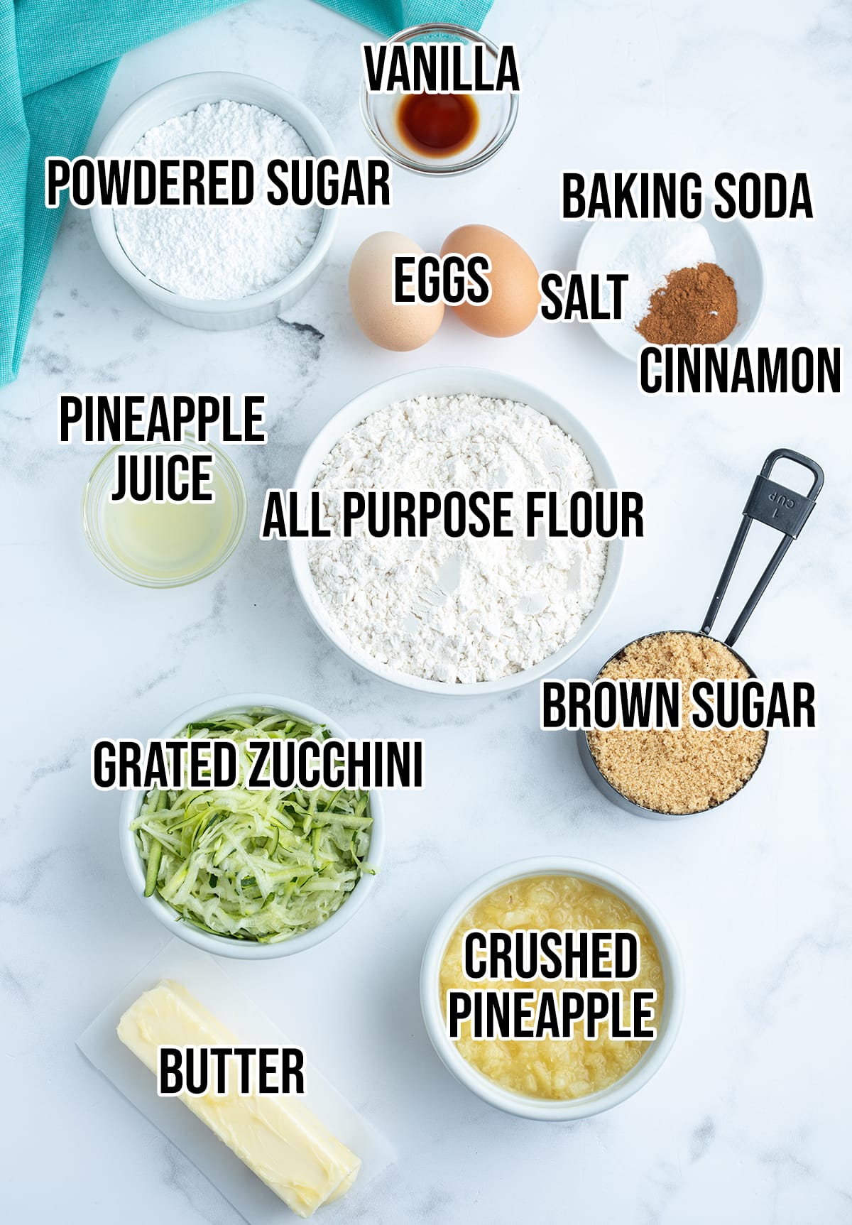 An overhead photo of the ingredients needed to make zucchini bread with pineapple.