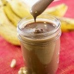 Close up view of chocolate banana peanut butter in a jar.