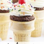 A cupcake in an ice cream cone topped with frosting, sprinkles, and a maraschino cherry, with a text overlay for pinterest.