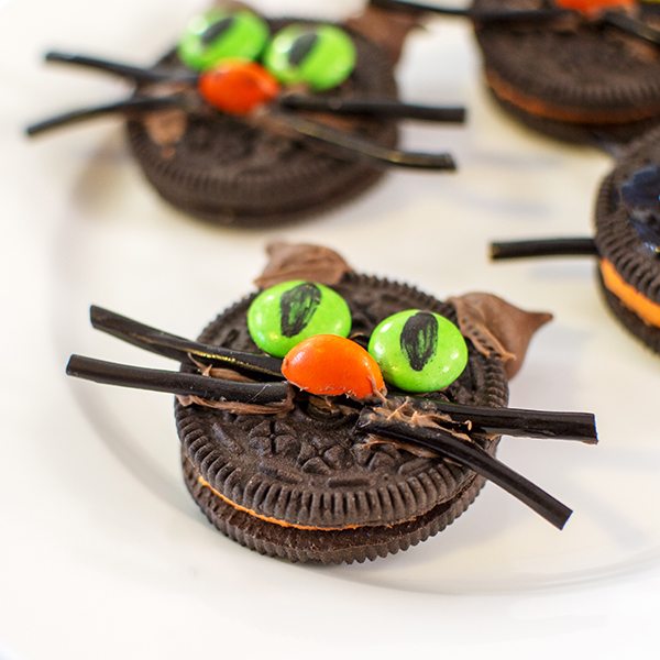 Angled view of a oreo cat cookie.