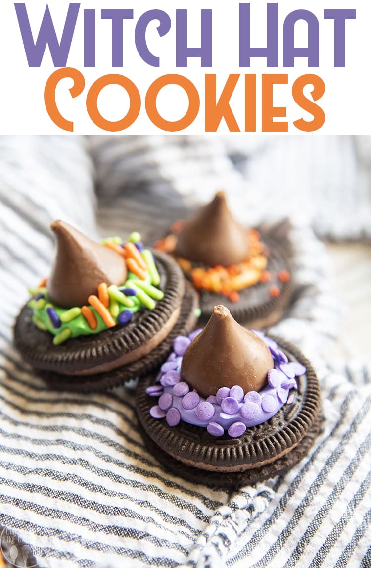 Witch hat cookies made with Oreos topped with frosting, sprinkles, and a hersheys kiss. 