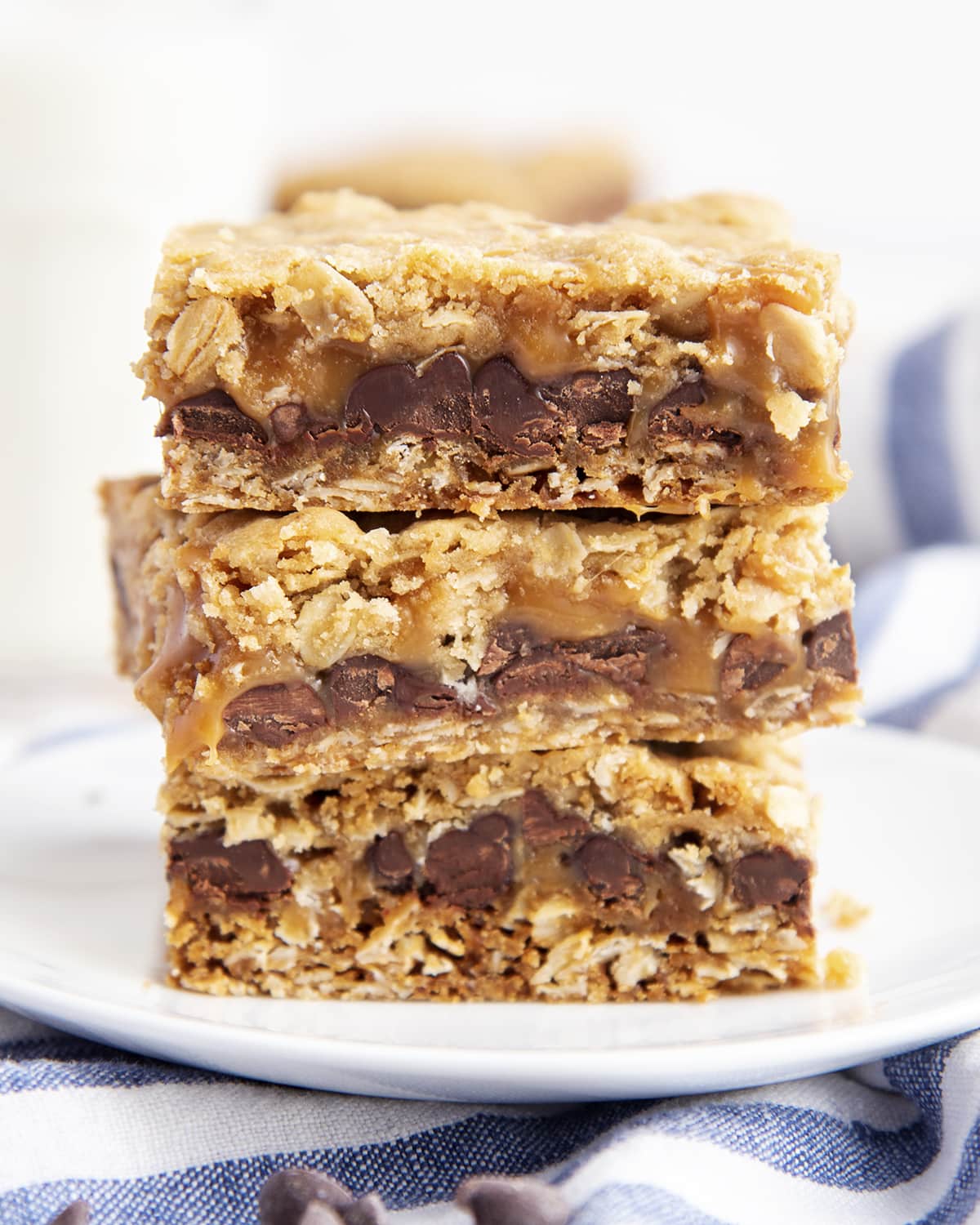 A stack of three carmelitas bars on a plate.