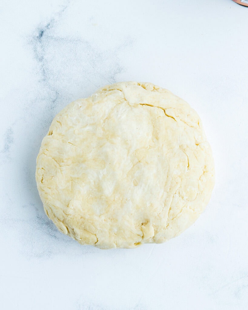 An above view of pie crust dough.