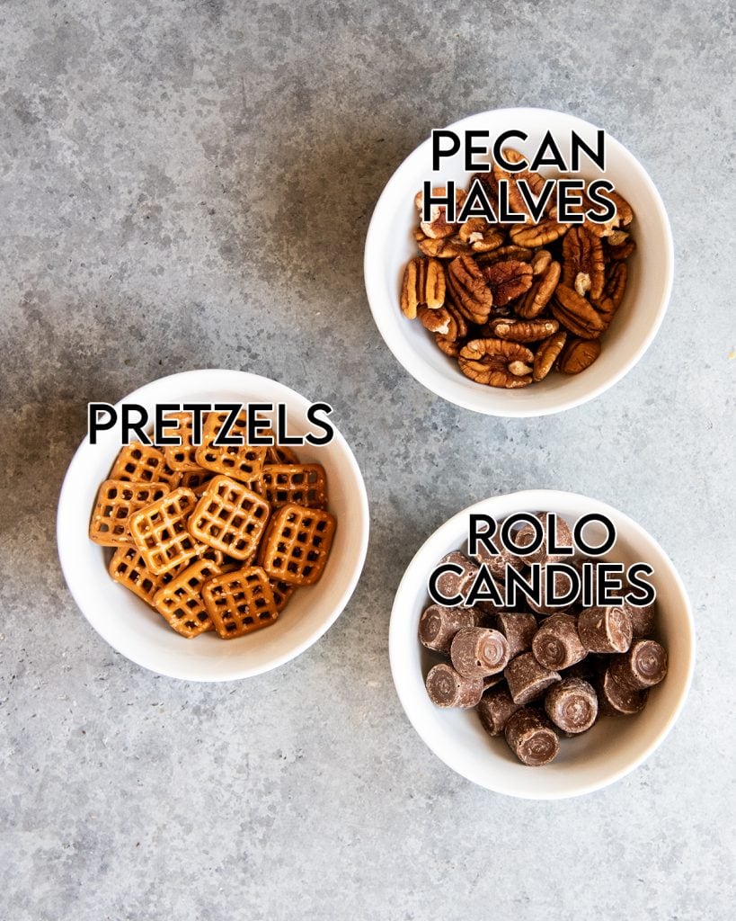 An overhead photo of the ingredients needed to make rolo pretzel turtles.