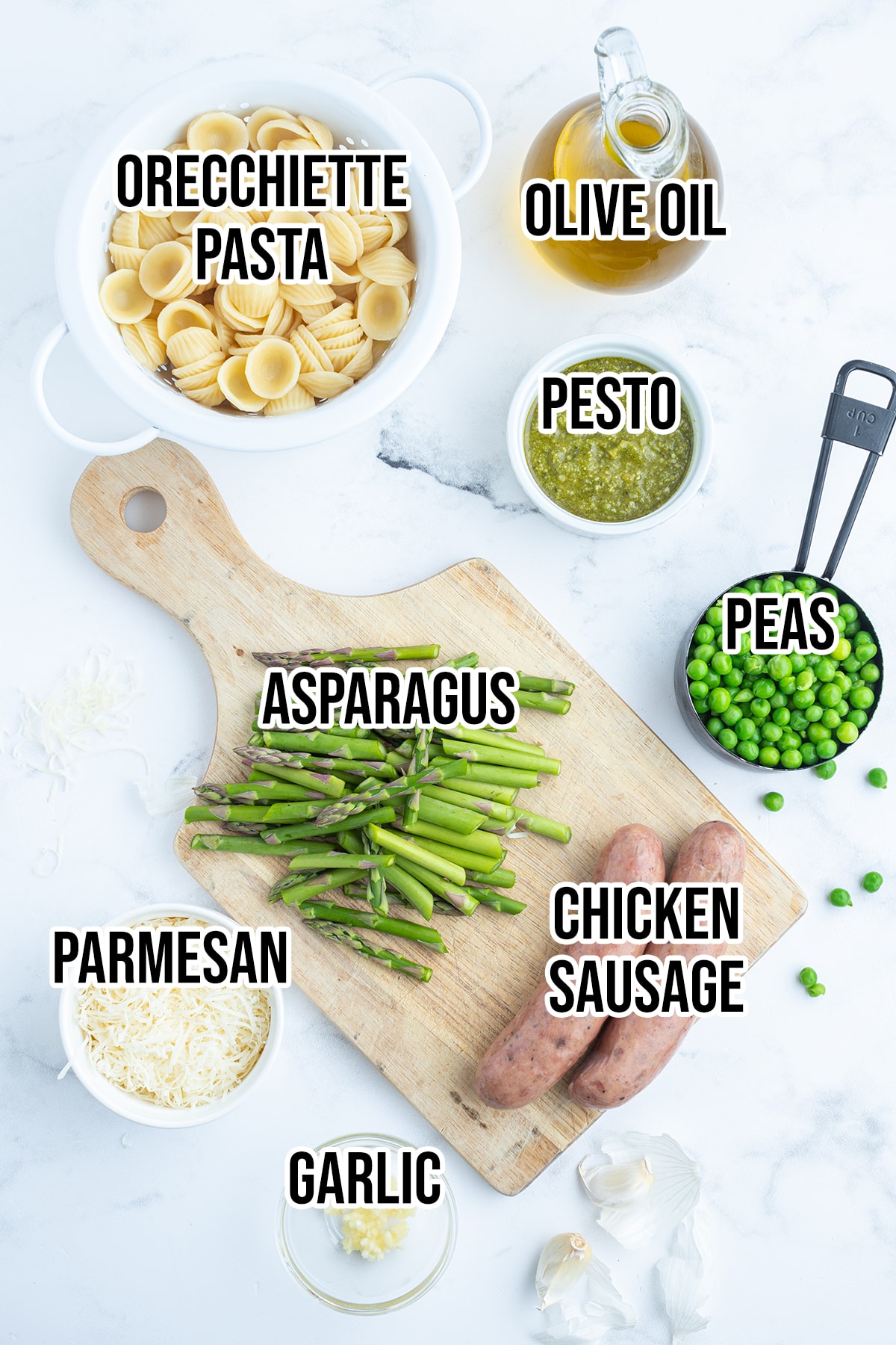 An overhead photo of the ingredients needed to make chicken orecchiette pasta.