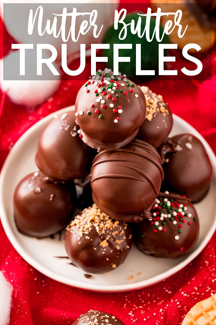 A stack of chocolate truffles on a white plate, with a text overlay that says Nutter Butter Truffles.
