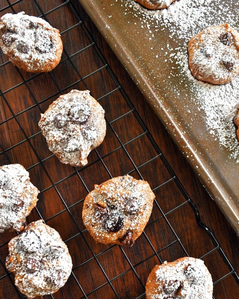 Above view of persimmon chocolate chip cookies on a cooling rack.