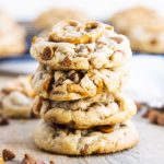 A stack of four pretzel and cinnamon chip cookies.