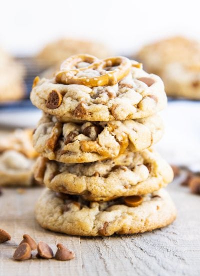 A stack of four pretzel and cinnamon chip cookies.