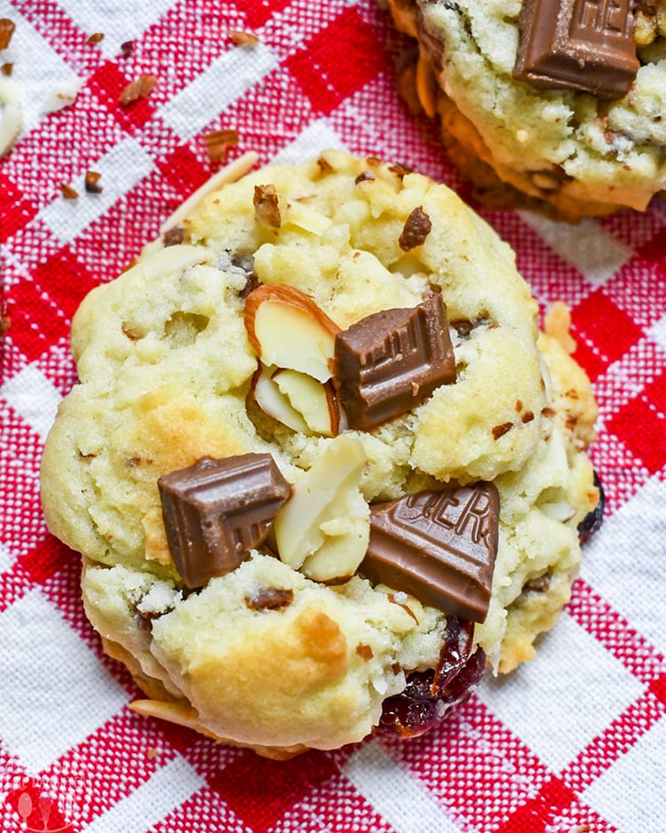 Close up top view of cherry chocolate almond cookies.
