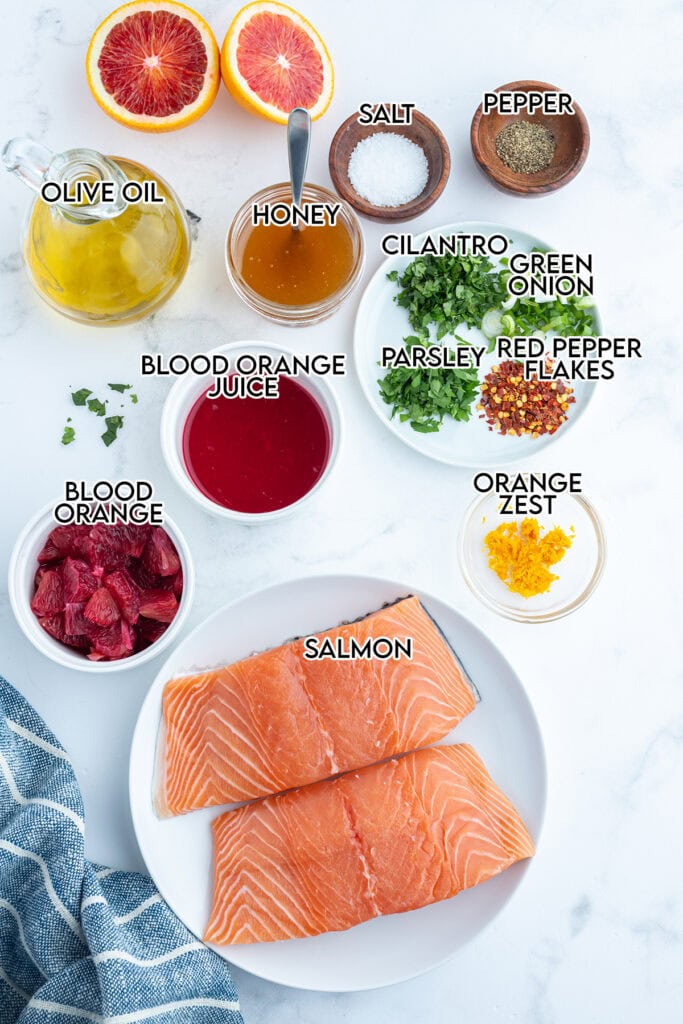 An above photo of the ingredients needed to make blood orange salsa topped salmon.