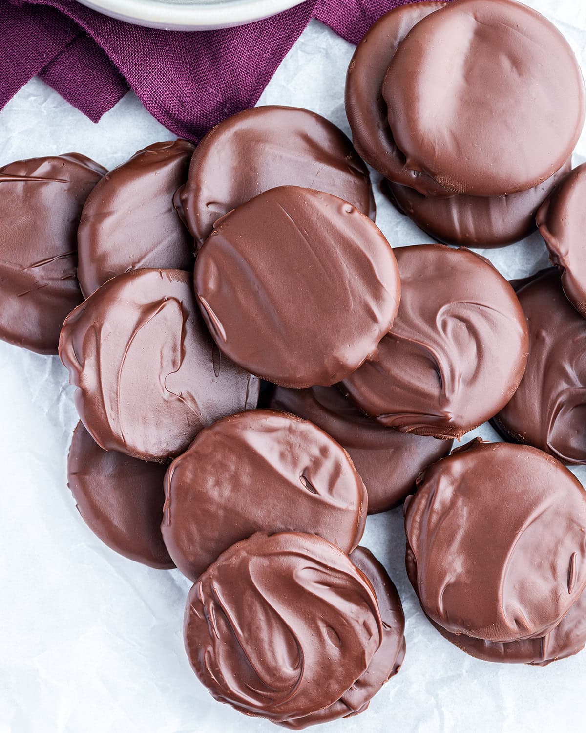 An above view of chocolate coated oreos, to make homemade thin mints.