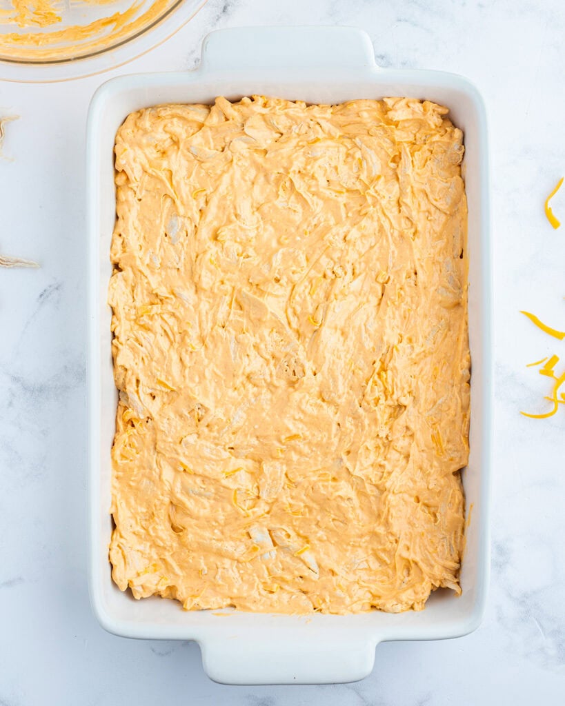 Buffalo chicken dip spread in a pan.