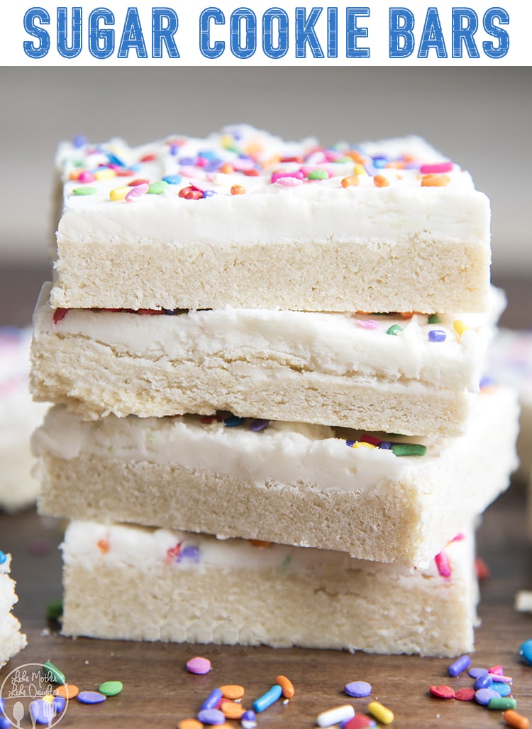A stack of 4 sugar cookie bars topped with a thick frosting and rainbow colored sprinkles. 