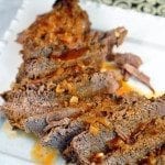 Angled view of sweet and savory brisket on a plate.