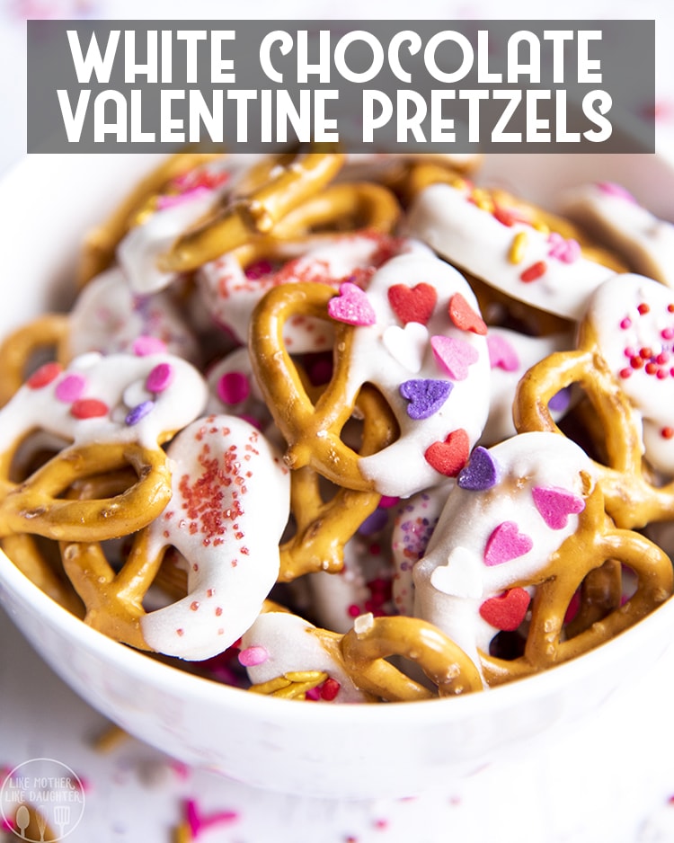 Close up shot of white chocolate valentine\'s pretzels in a bowl with title card.