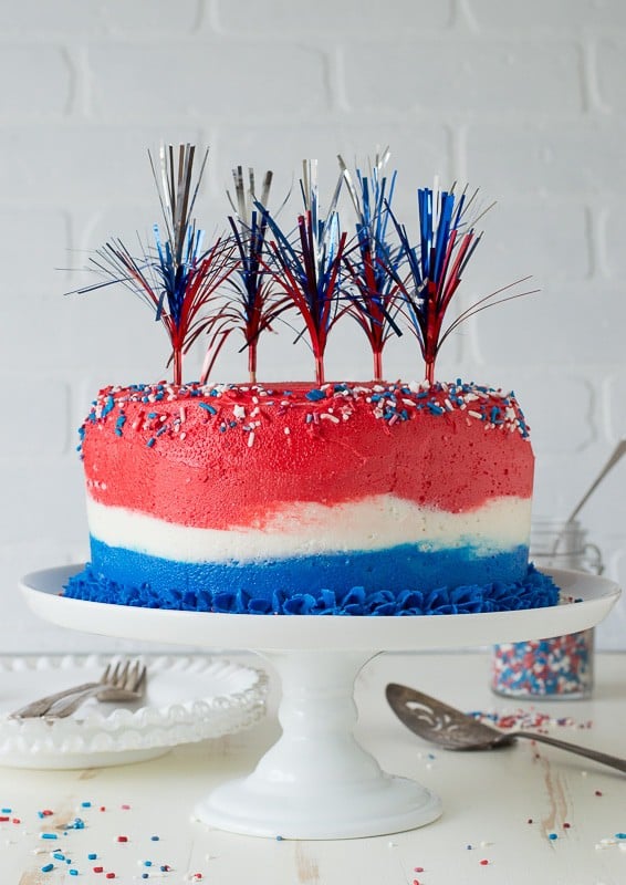 Front view of 4th of July Ombre Cake with red white and blue stripes.