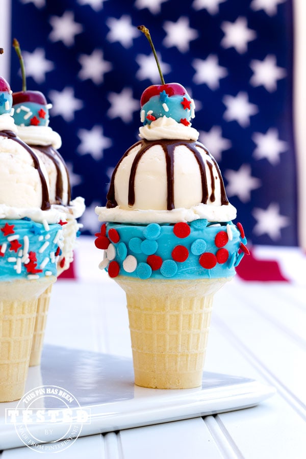 Front view of red white and blue ice cream in a cone.