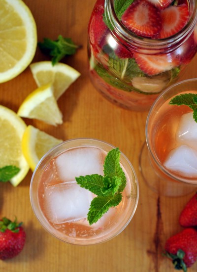 Above view for strawberry grapefruit minty infused water in glasses.
