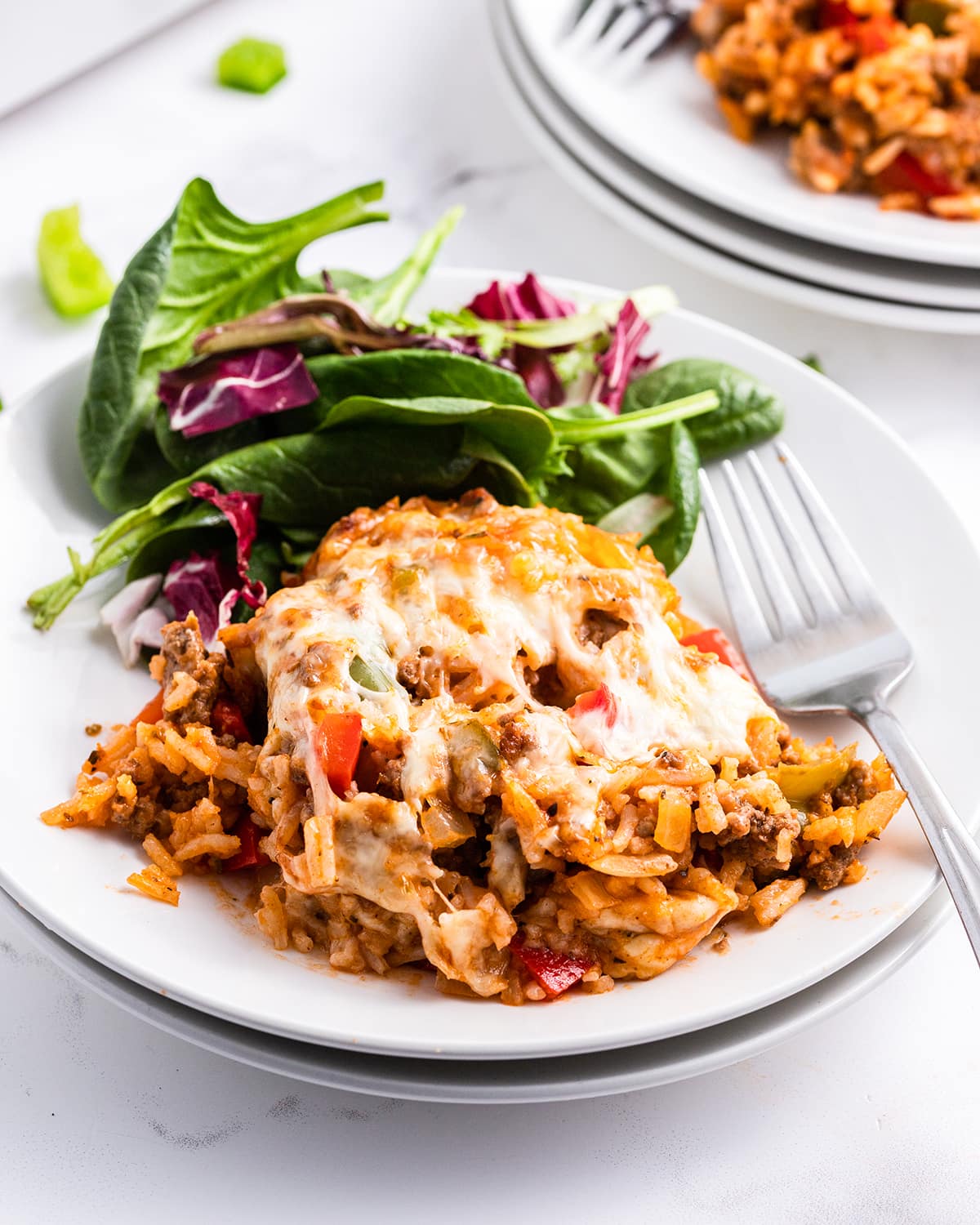 A serving of unstuffed pepper casserole on a dish.