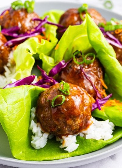 A close up of teriyaki meatball lettuce wraps.