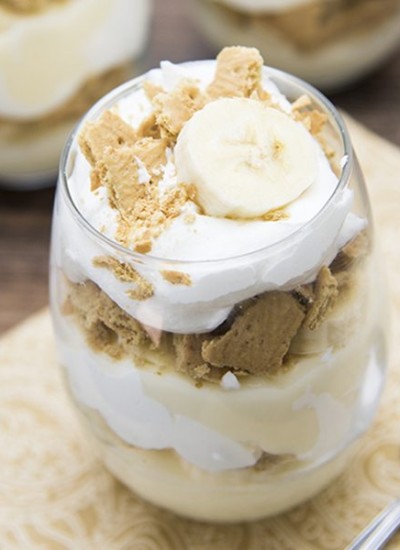 Angled view of banana cream pie yogurt pie in a glass clup.