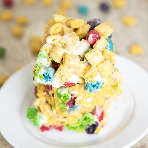 Angled view of captain crunch marshmallow crispies on a white plate.