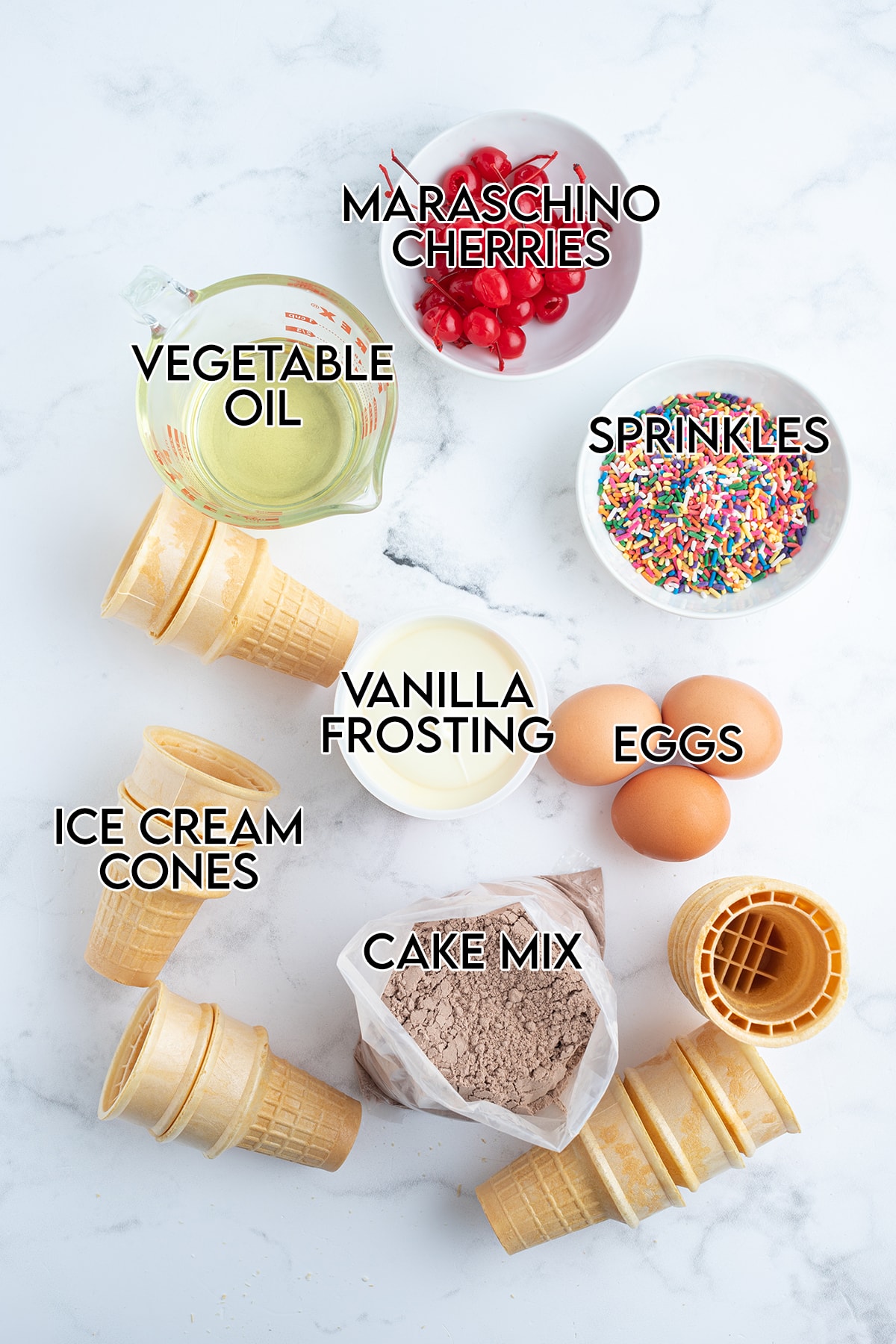 An overhead photo of the ingredients needed to make ice cream cone cupcakes. 