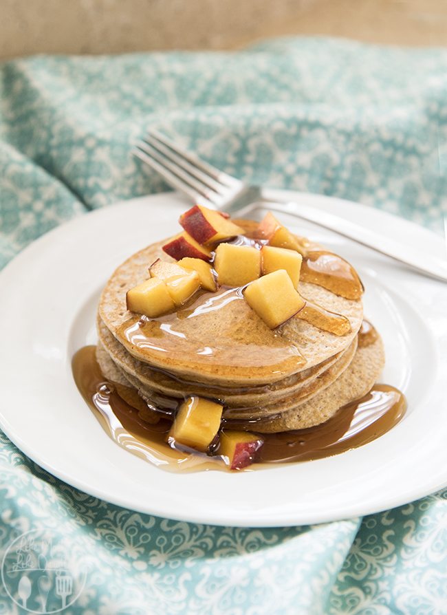 Angled view of biggest loser pancakes stacked on a white plate.