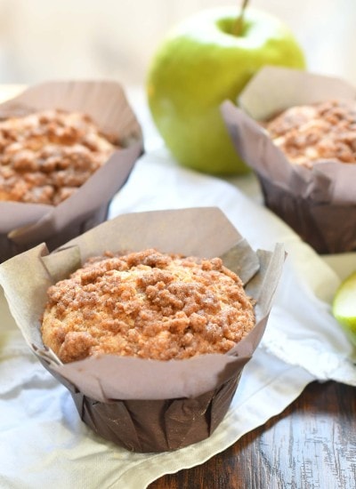 Apple cinnamon muffins baked with apples and applesauce topped with an amazing cinnamon crumb!