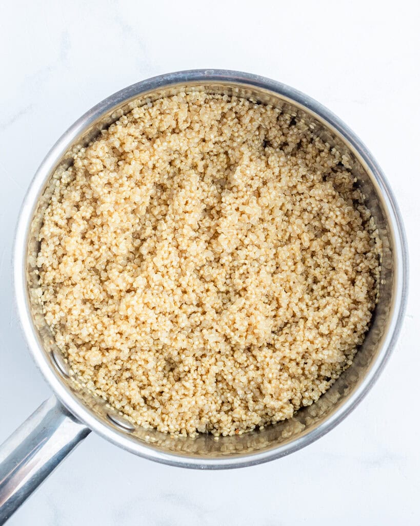 A pot of cooked quinoa.