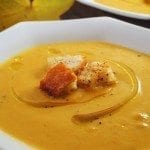 Autumn soup combines acorn and butternut squash with pumpkin, apples, onions, and sage. The perfect rendering of fall in a soup.