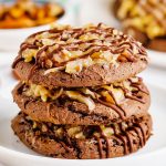 A stack of three German chocolate cake cookies.