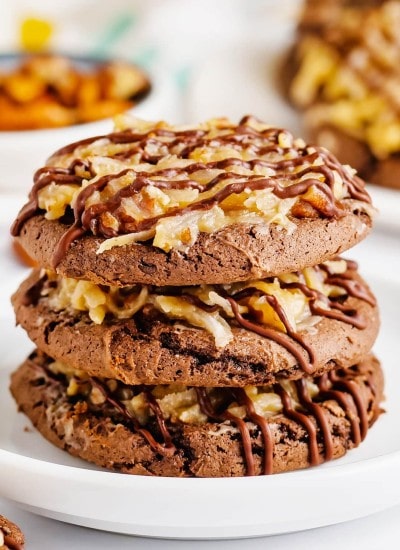 A stack of three German chocolate cake cookies.