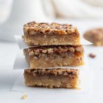 A stack of three pecan pie bars