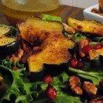Close up of roasted autumn squash with pecans.