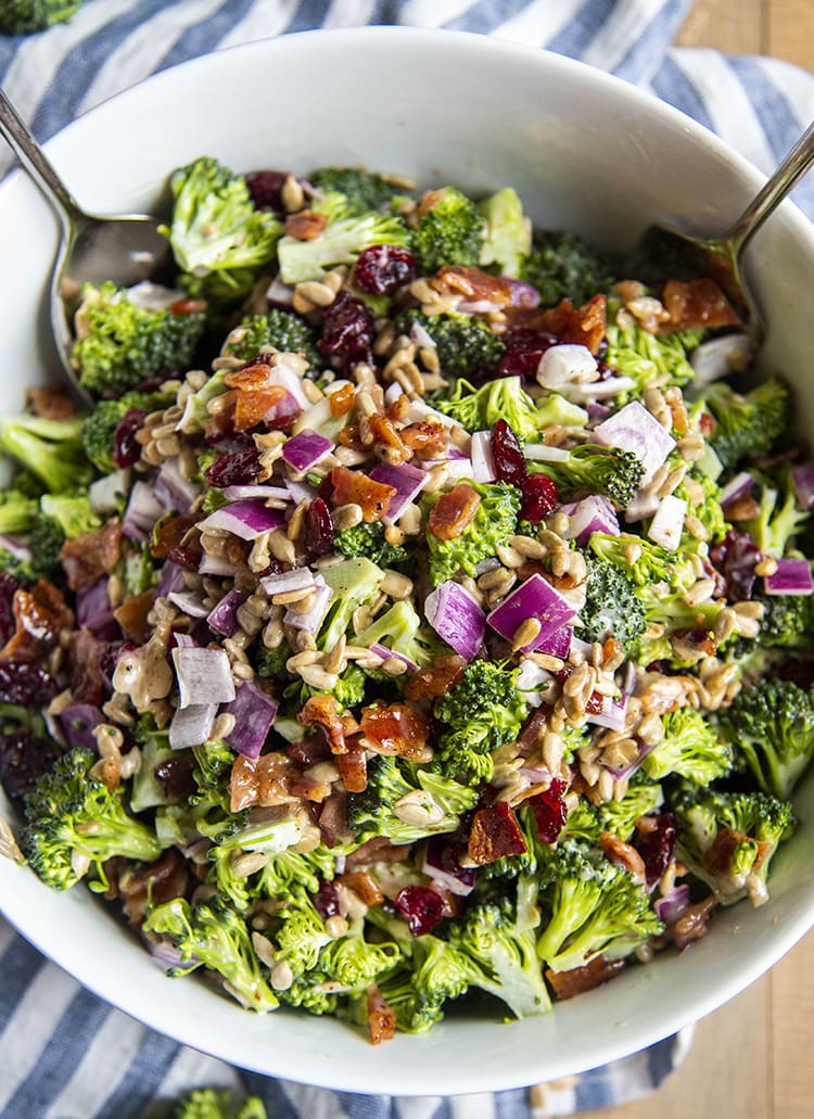 An overhead shot of chopped broccoli salad in a bowl.