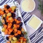 A savory roasted sweet potato flavored with fresh herbs of chives, rosemary, and thyme served with a rosemary garlic aoli sauce