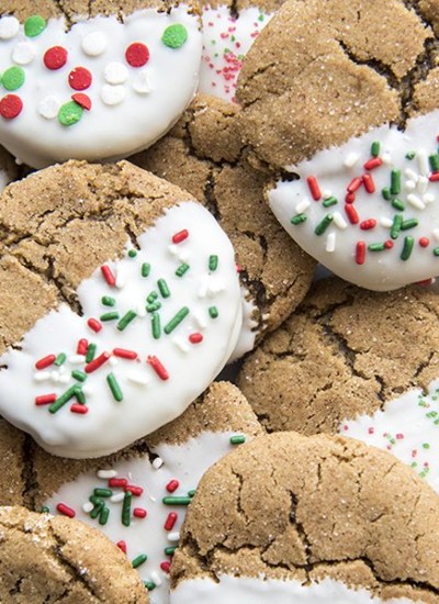 Close up view of white chocolate dipped ginger cookies.