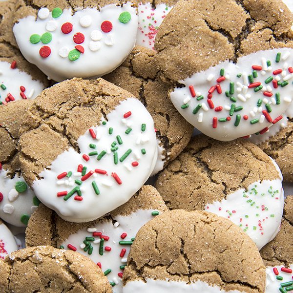 Close up view of white chocolate dipped ginger cookies.