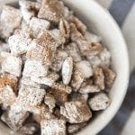 Close up image of small batch muddy buddies in a white bowl.