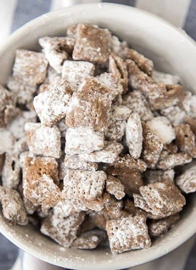 Above image of small batch muddy buddies in a white bowl.