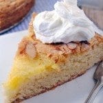 An almond lemon curd cake baked like a citrus tart with all the goodness of toasted almonds and lemon curd in a torta.