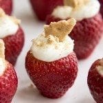 Close up of cheesecake stuffed strawberries.