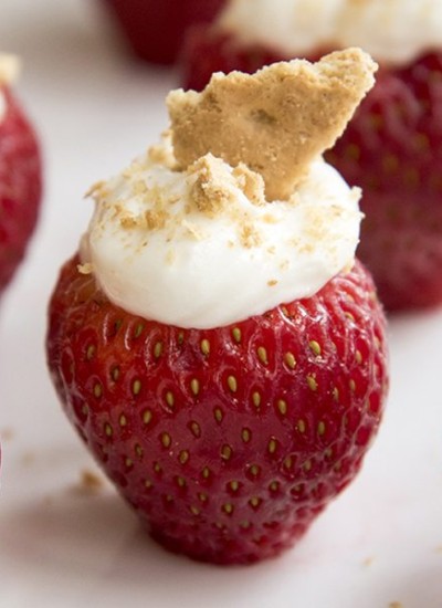 Close up of cheesecake stuffed strawberries.