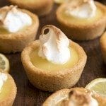Mini lemon meringue pies with cookie crusts.
