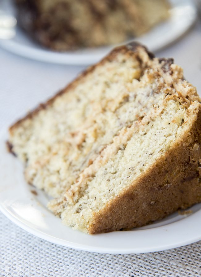 This perfectly moist and delicious banana cake is topped with an amazing peanut butter frosting and chocolate ganache. This cake is sure to be a hit!