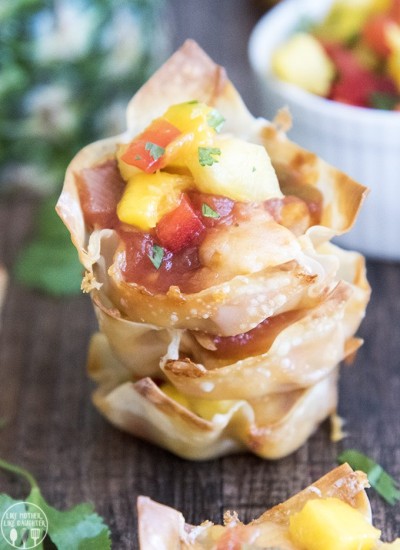 Close up image of pineapple chicken taco wonton cups.